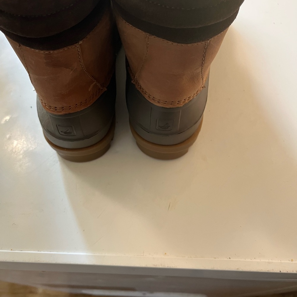 Sperry boots they are brand new never been worn .